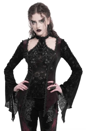 Wine red gothic lace bell sleeve top with rose embellishments - front three-quarter view on model showing dramatic bell sleeves and lace detailing