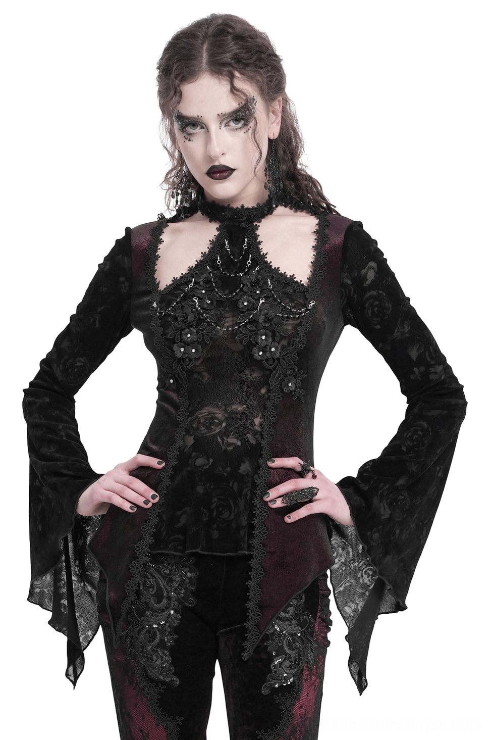 Wine red gothic lace bell sleeve top with rose embellishments - front three-quarter view on model showing dramatic bell sleeves and lace detailing