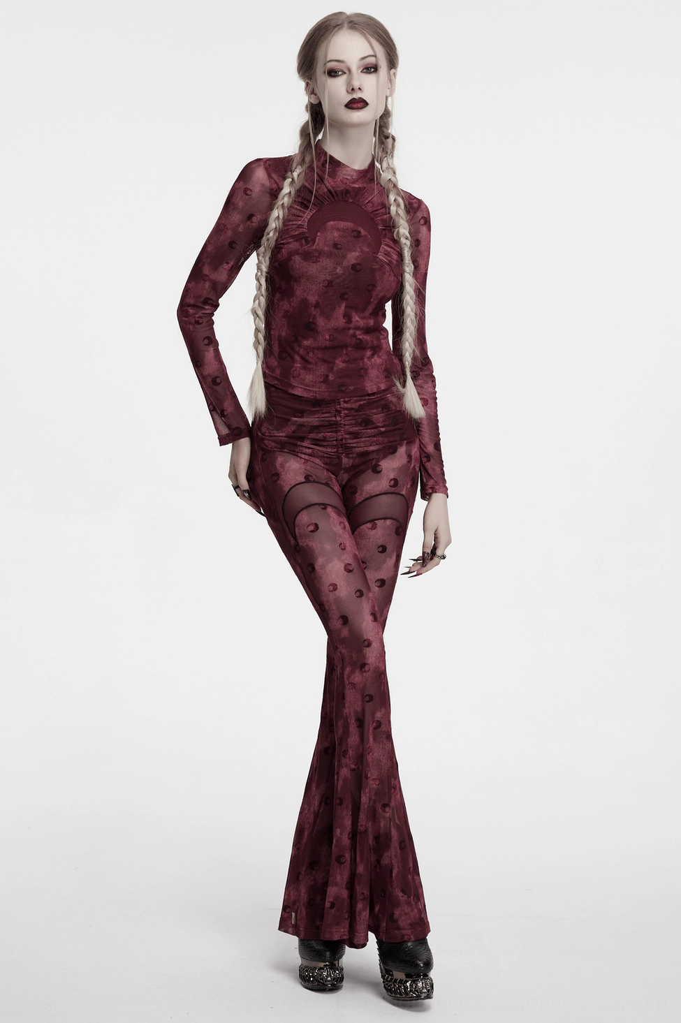 Wine red gothic mesh flare trousers with crescent print close-up fabric texture