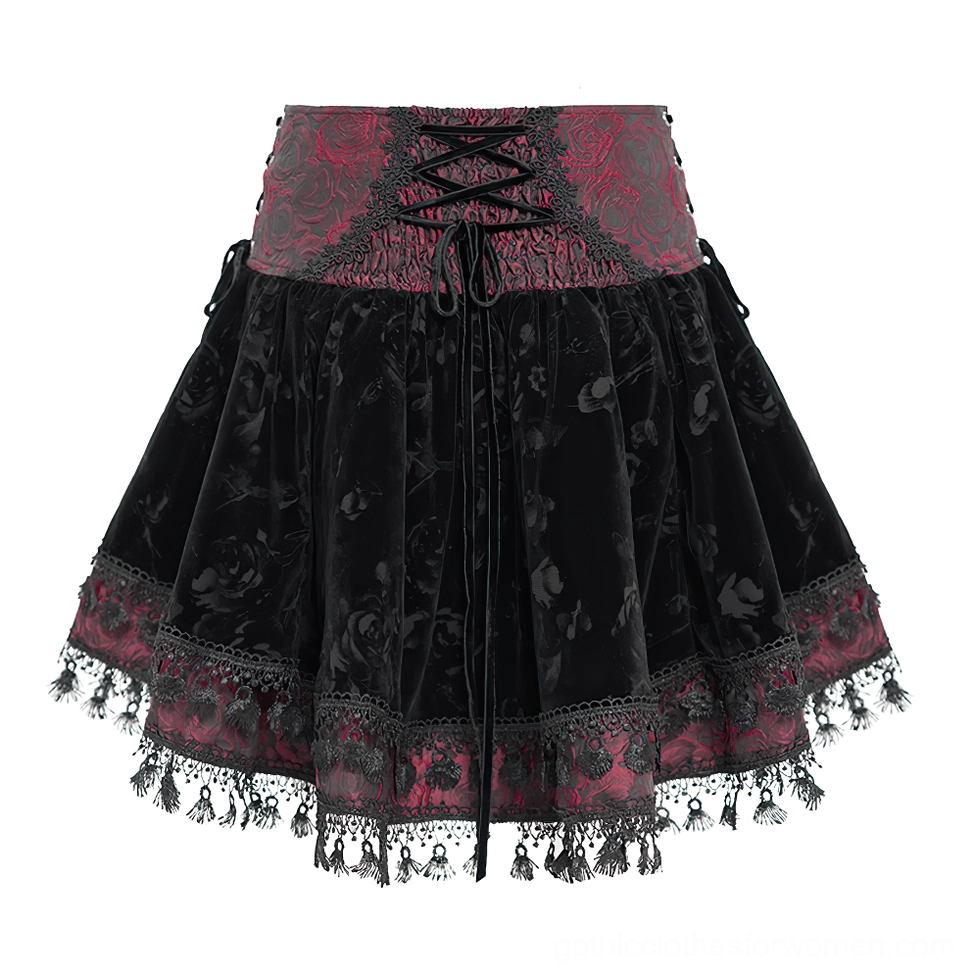 Front flat lay view of gothic lace-up skirt showing front lace-up waist and black lace tassel trim