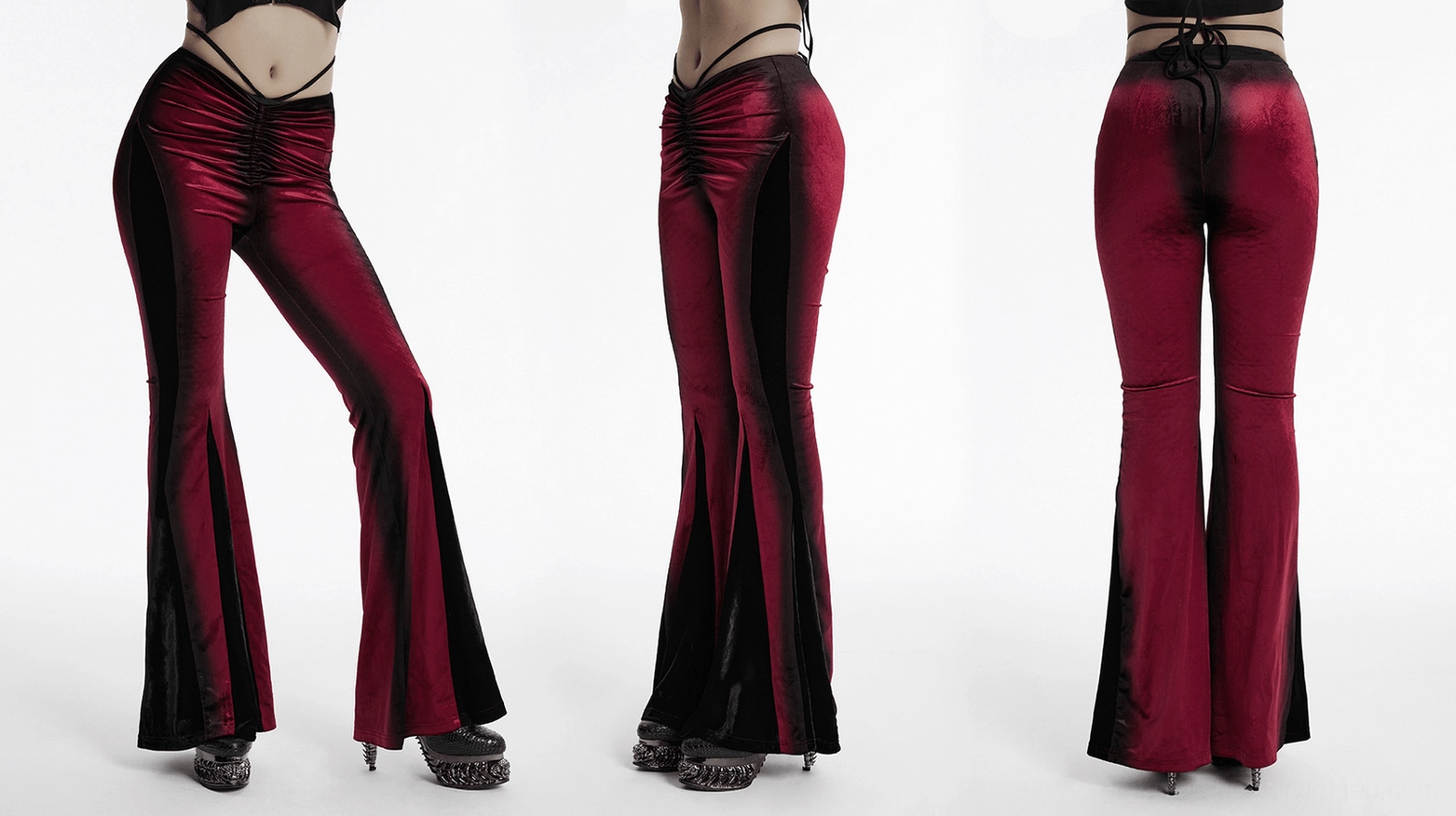 Wine red gothic velvet flared pants on model showing dramatic flare and slim upper fit