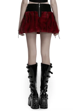 Rear view of flame tie-dye gothic skirt showing back zipper closure and adjustable side straps with platform boots