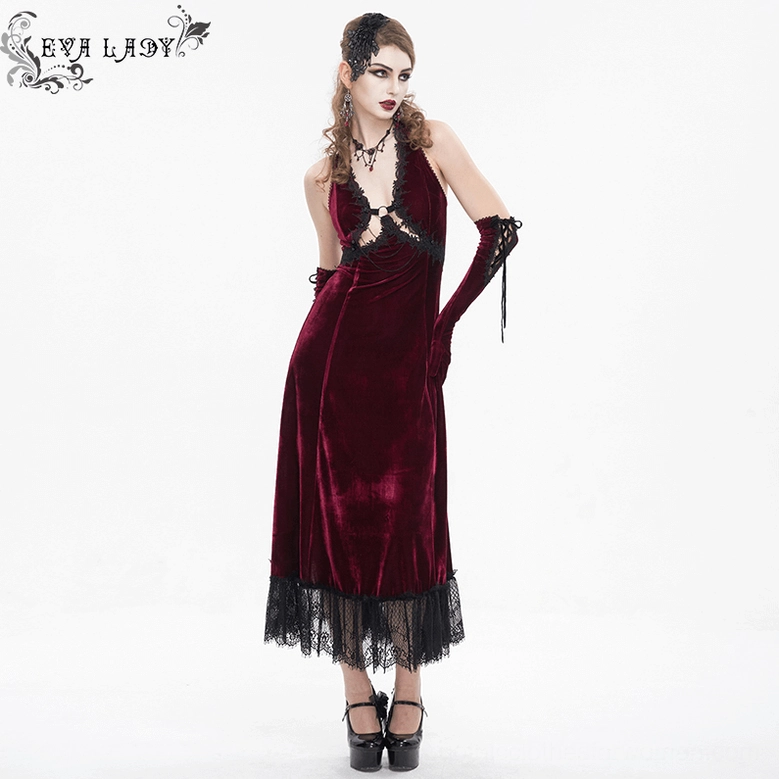 Wine red velvet texture with strategic cutout and black lace appliqué showing gothic dress construction quality