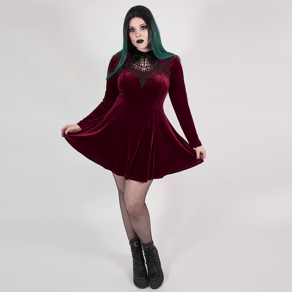 Wine red velvet gothic dress full body view highlighting fitted bodice and flared hemline with gothic aesthetic
