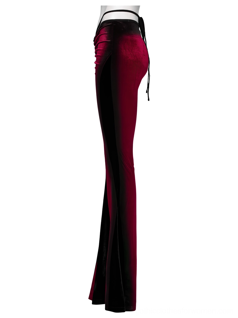 Wine red velvet gothic flared pants side view showing slim fit thigh and flared silhouette