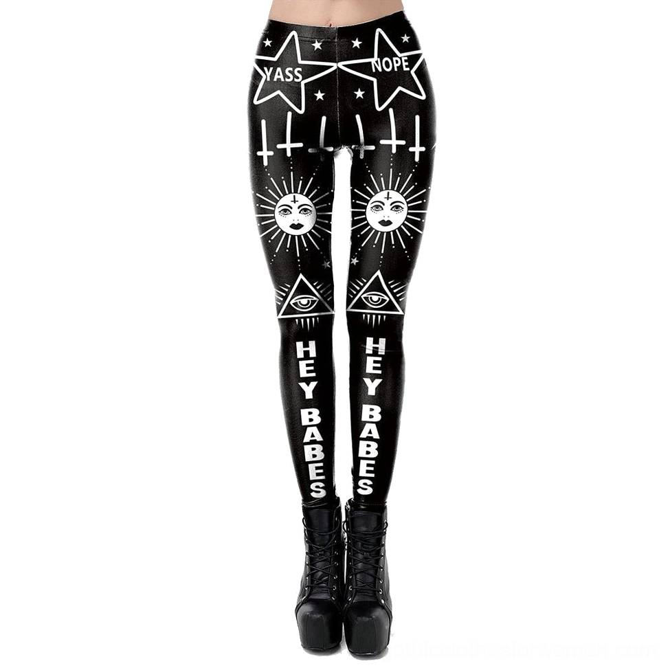 Black witchcraft print leggings front view showcasing sun face, all-seeing eye, stars and 'HEY BABES' text