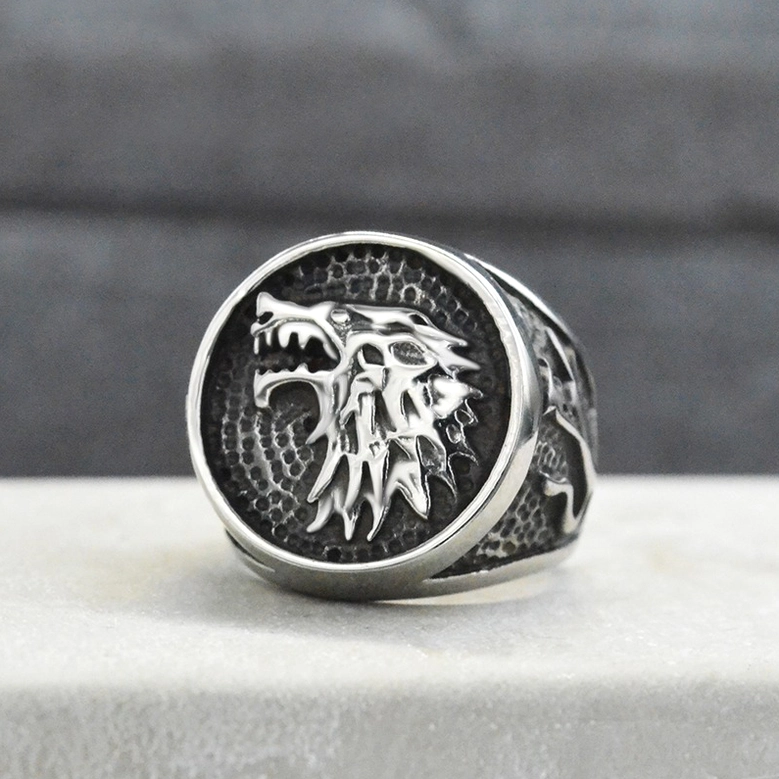 Wolf head gothic signet ring hammered texture vintage silver round face three-quarter view
