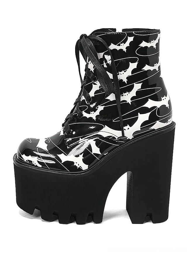 Women's gothic bat print platform ankle boots, right side profile view displaying side zipper closure and chunky block heel with lug sole