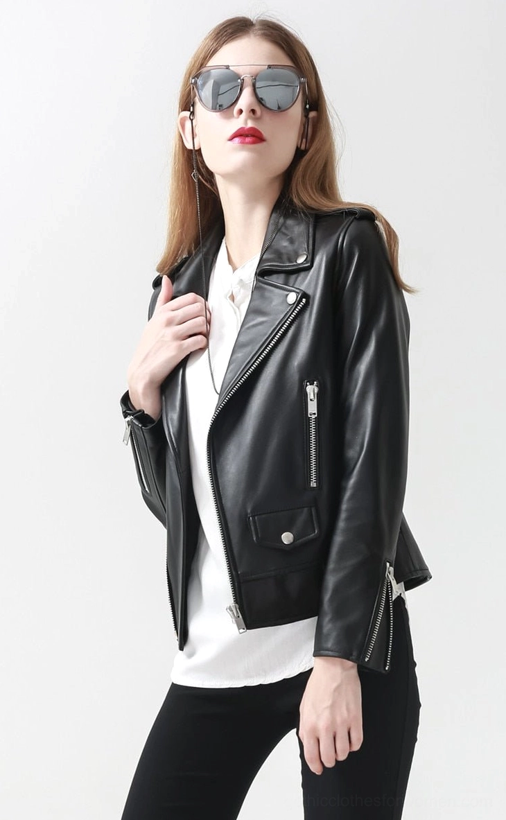 Women's genuine sheepskin black leather gothic motorcycle jacket full product view on model, capturing edge and rock aesthetic