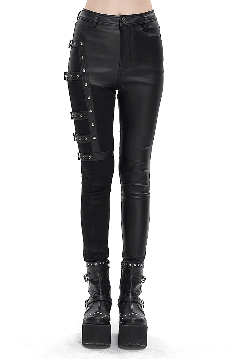 Women's black multi-buckle gothic pants front view on model, slim-fit splice design with metal buckle straps on left thigh