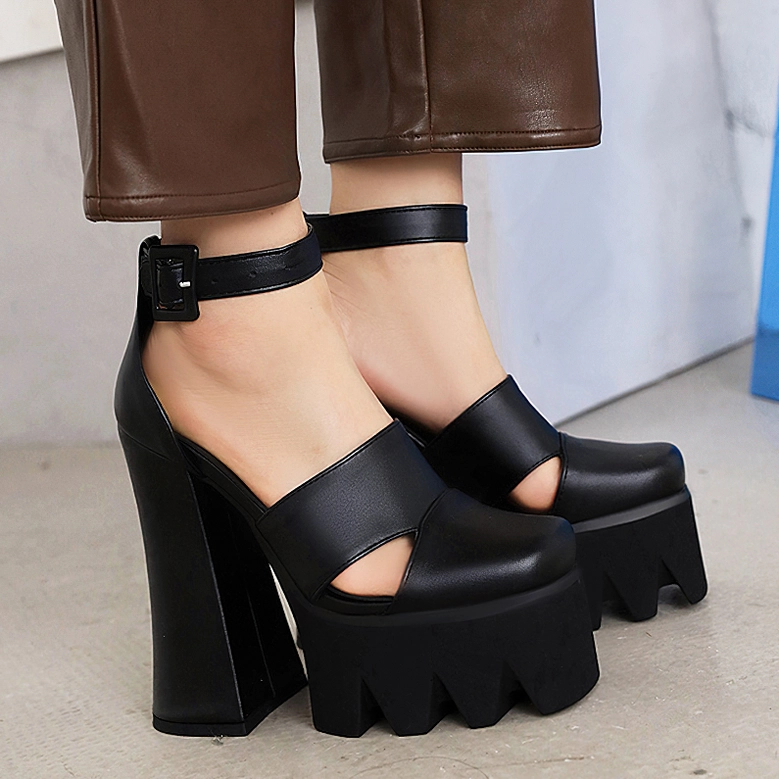Women's gothic platform ankle strap heels displaying sleek silhouette and commanding block heel structure for alternative fashion
