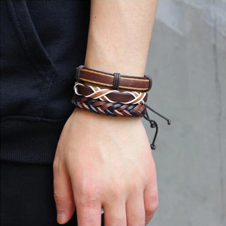 Woven brown and white leather gothic bracelets on male wrist, showcasing textural braided details and mixed tone design in close-up side view