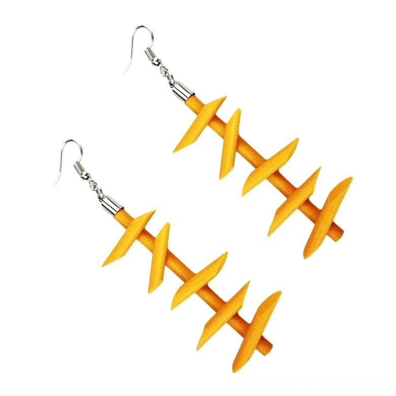 Yellow twisted spike rubber dangle earrings matching pair set gothic punk jewelry matte finish flat lay