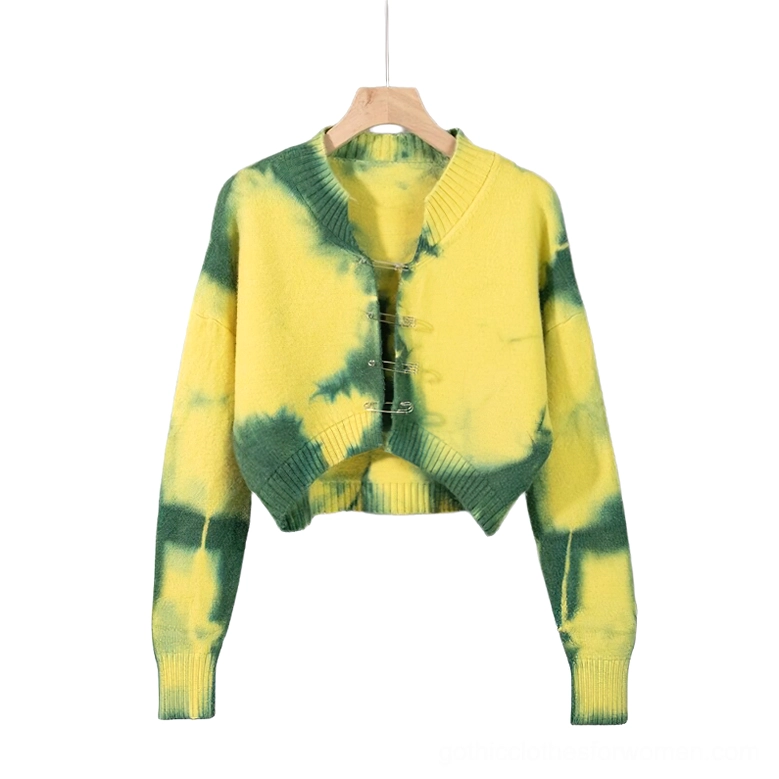 Yellow tie-dye cropped cardigan displayed flat, showing full front with safety pins