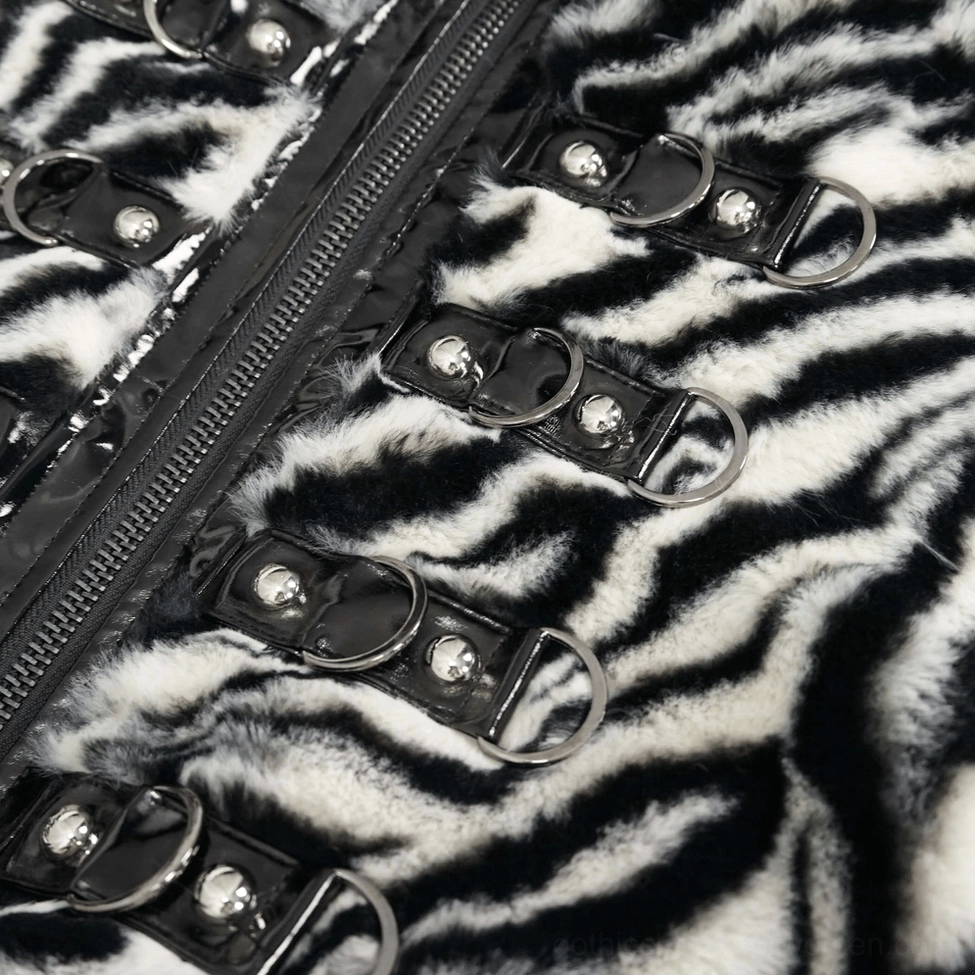 Zebra stripe gothic faux fur jacket color and pattern detail highlighting monochromatic black and white striped design