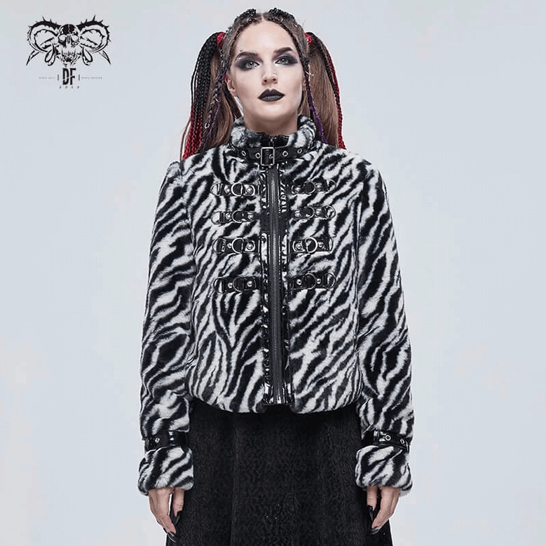 Cuff and sleeve detail of zebra stripe gothic jacket showing buckle strap system and faux fur material quality